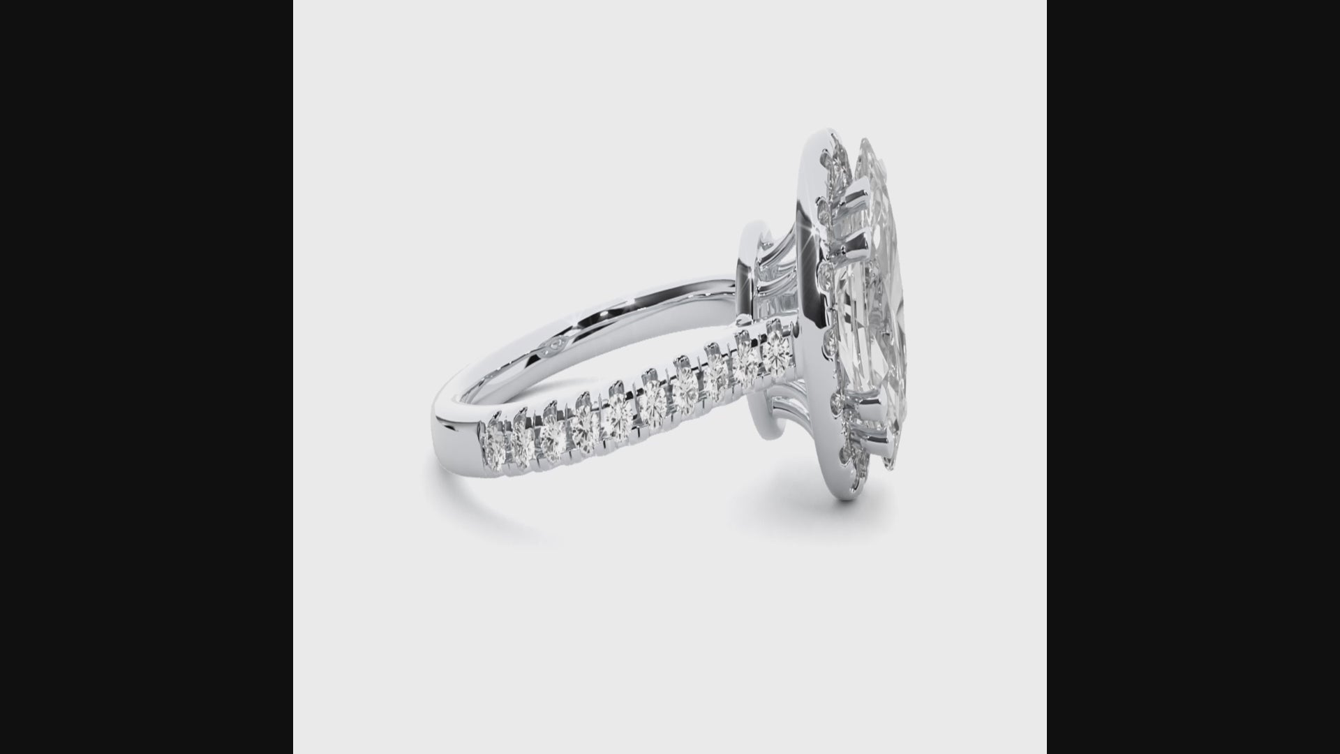 1.1+0.21 Ct Oval + Round Diamond Ring