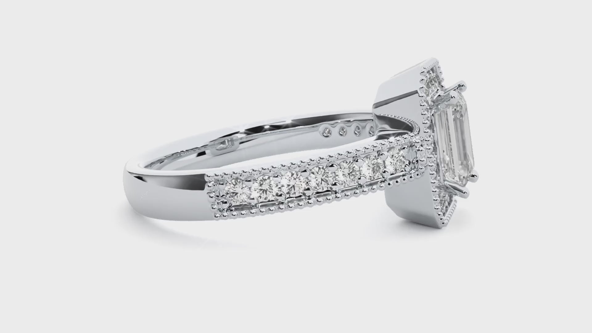 0.30+0.8Ct Round + Emerald Diamond Ring