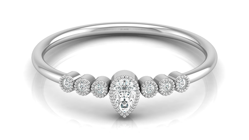 0.04 +0.09  Ct Round + Pear Diamond Ring