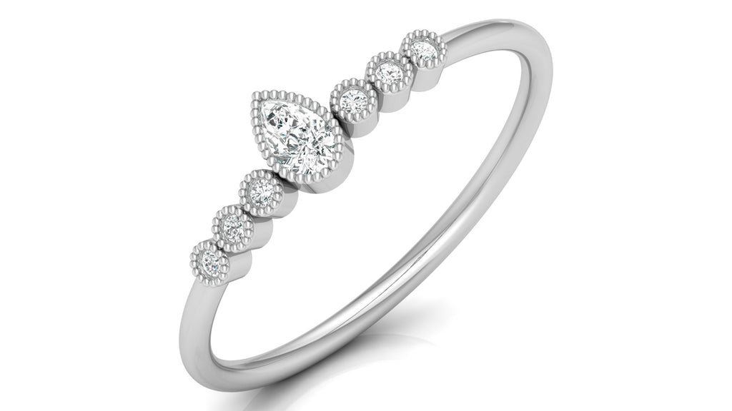 0.04 +0.09  Ct Round + Pear Diamond Ring