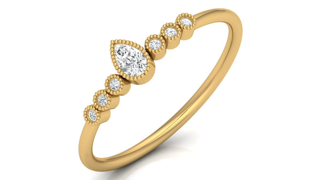 0.04 +0.09  Ct Round + Pear Diamond Ring