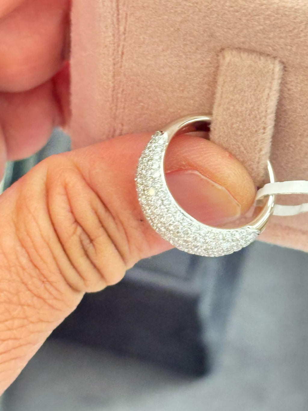 Micro pave round cut diamond dome ring

